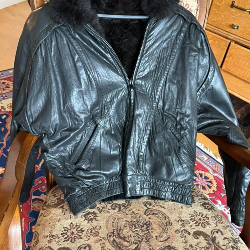 A  reversable Leather jacket, bought in Vail Colorado
